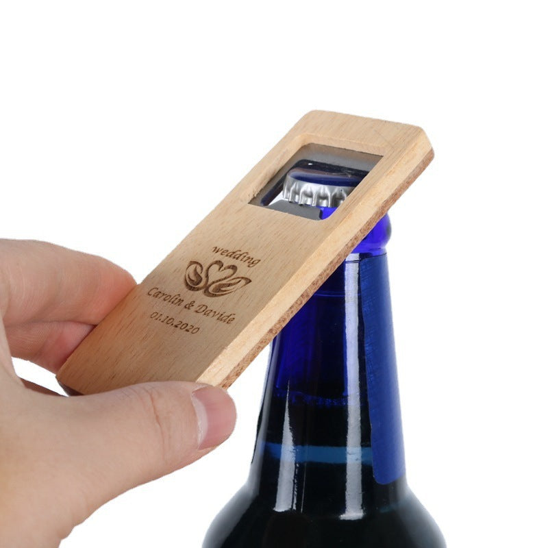 A wooden bottle opener with a sturdy grip, perfect for effortlessly opening bottles- yourstuffmade